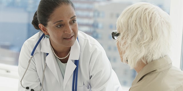 doctor talking with patient