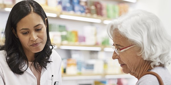 pharmacist with patient